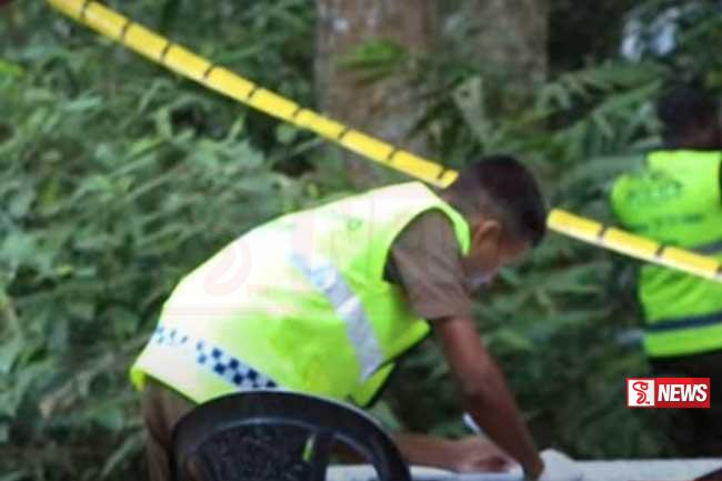 පිළිස්සුණු මළසිරුරක් මෝටර් රථයක් තුළ