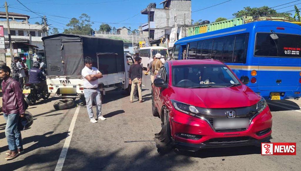 මෝටර් රථයක් සහ ලොරි රථයක් ගැටී ගමනාගමනයට බාධා